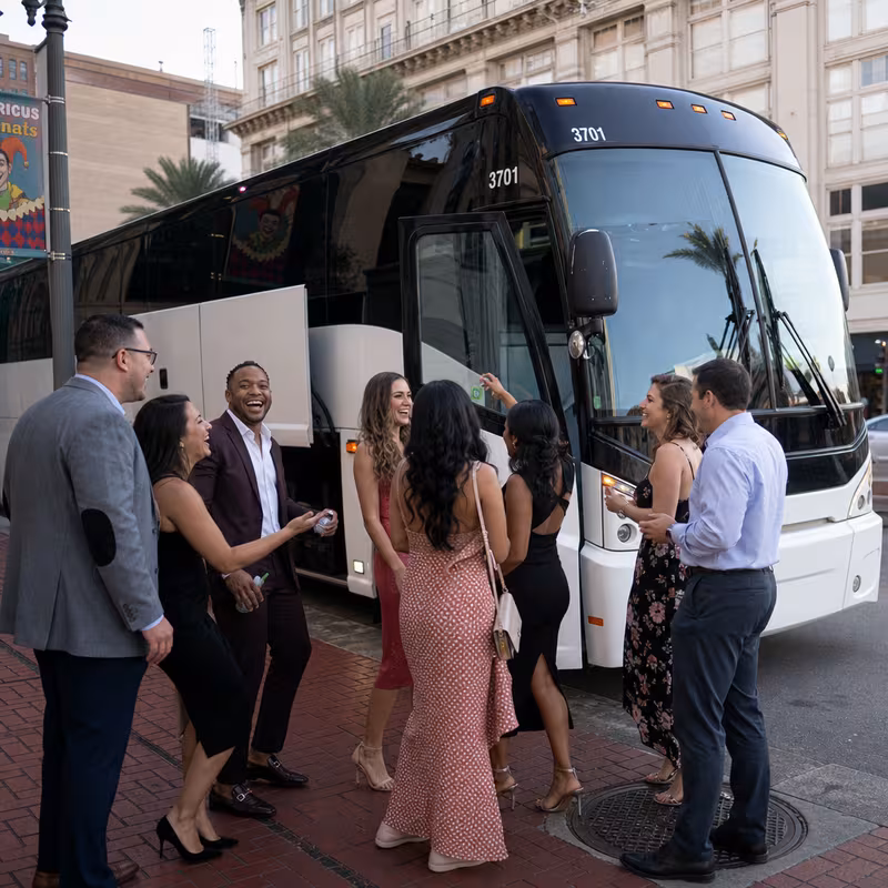 Passengers loading luggage while boarding an New Orleans group shuttle