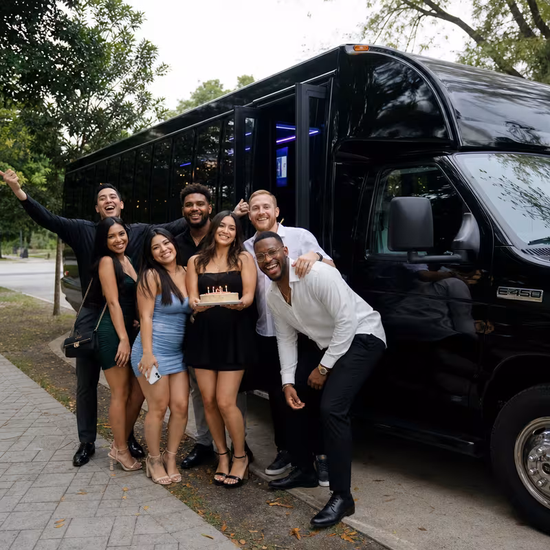 Party bus interior with wraparound leather seating and LED lighting in New Orleans